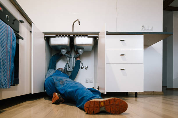 Professional Plumbing technician working in Thompson, OH